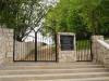 A view of the newly constructed gate and memorial plaque at the Jewish cemetery in Ilza, Poland.